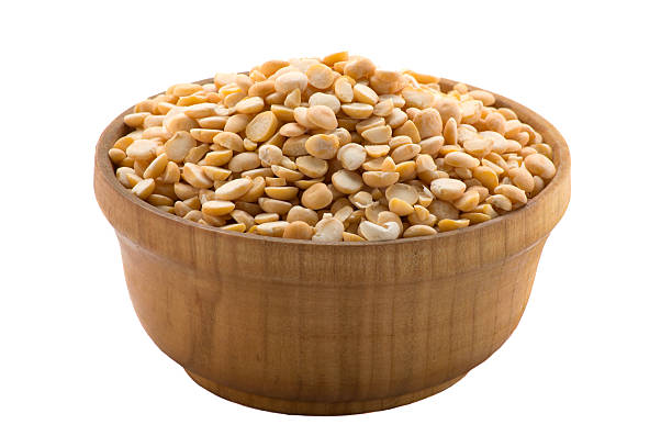 istock Yellow peas in a wooden bowl 627177784