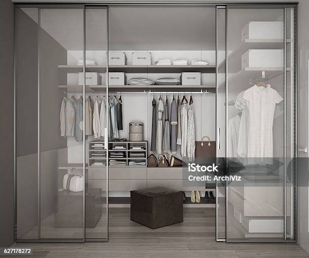 Classic Walk In Closet With Glass Sliding Doors Stock Photo - Download Image Now - Closet, Organization, Personal Organizer