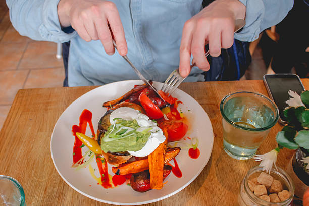 istock Adult man eating breakfast meal 627183426