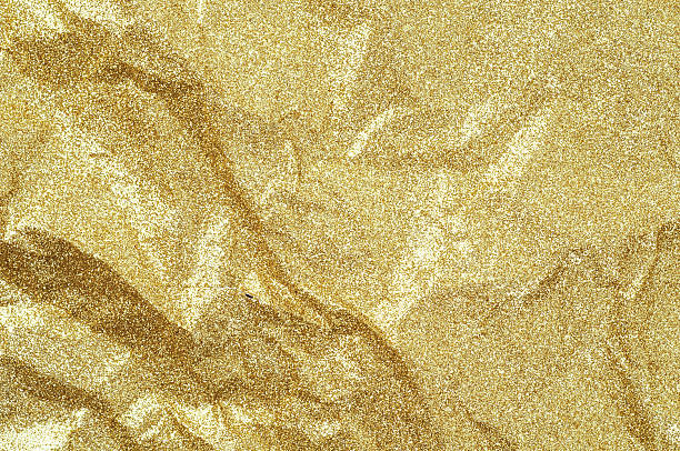 istock Gold wrinkled paper texture abstract background 627183532