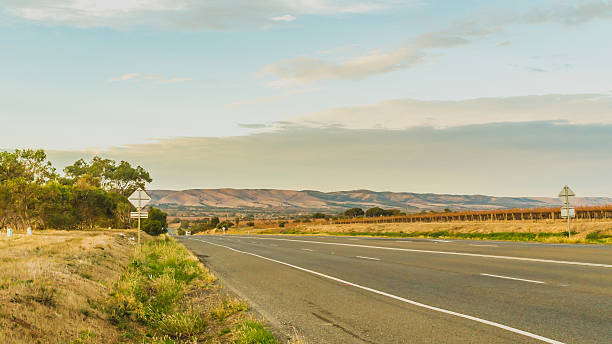 istock country road surrounded by mountains and vineyards 627185938