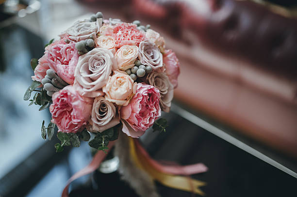 istock pink bridal bouquet with ribbons 627186144