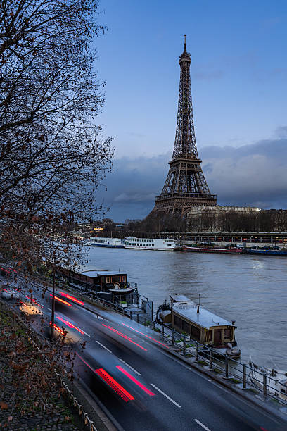 istock Eiffel Tower at twilight and Seine River, Paris 627200942