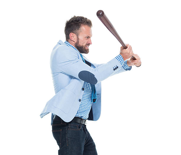 istock Angry businessman fighting with baseball bat 627201486