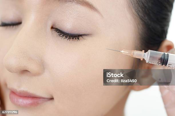 Young Woman Gets Beauty Injection In Her Face Stock Photo - Download Image Now - Adult, Adults Only, Beautiful People
