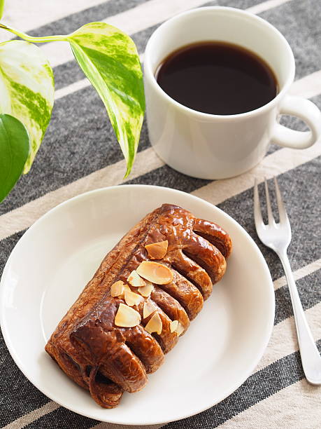 istock chocolate danish with cup of coffee 627218650