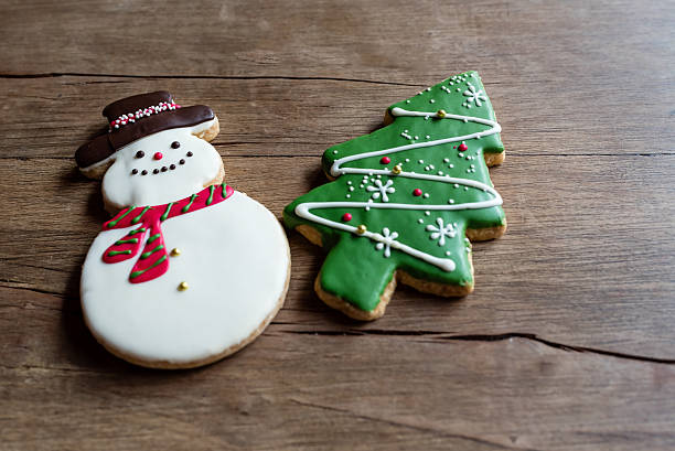 istock Christmas theme ginger bread on wooden background 627219526