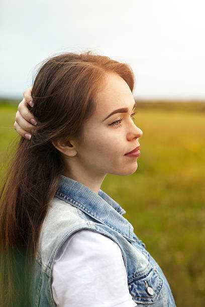 istock The girl in a meadow 627224906