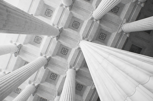 Architectural column detail from old government building in downtown Bucharest, Romania