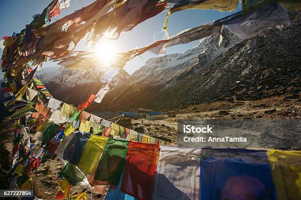 Tibetan Flags On Annapurna Base Camp In Nepal Stock Photo - Download Image Now - Activity, Adventure, Asia