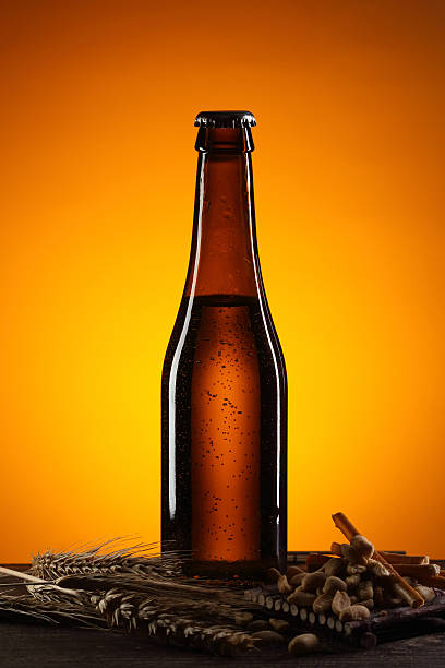 istock Cold bottle of beer with condensated water drops on it 627229970