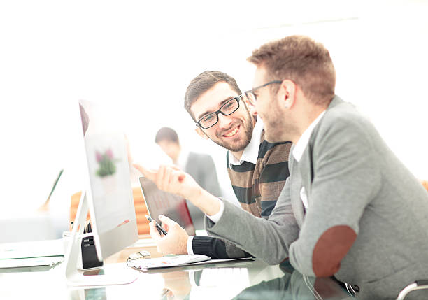 istock Coworkers photo in sunny office 627231302