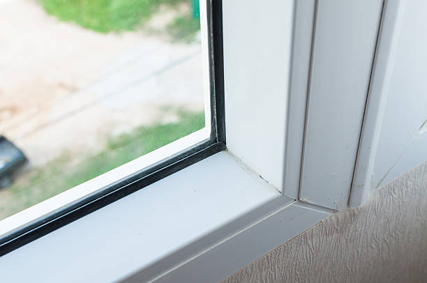 istock corner of room wall with glass 627232184