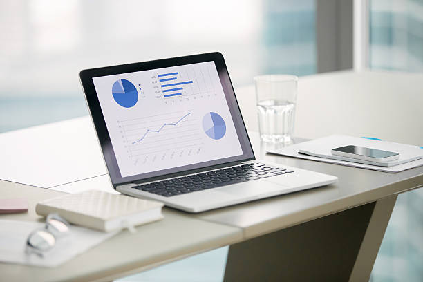 istock Close up of a laptop on a modern office desk 627232336