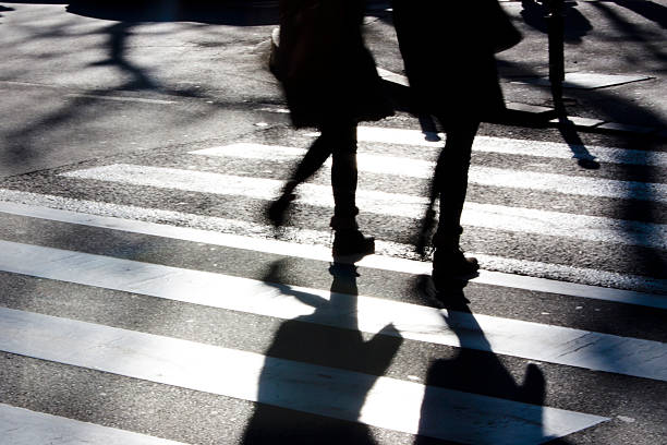 istock Blurry zebra crossing with pedestrians 627241506