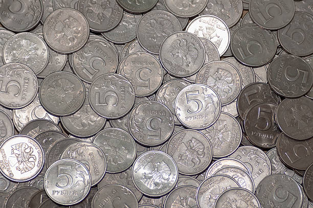 istock Russian coin five rubles in large quantities. on coins background 627249558