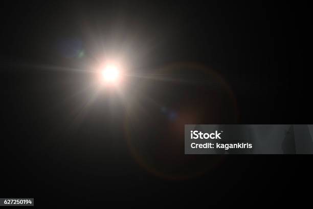 Light Blast Stock Photo - Download Image Now - Lens Flare, Sunlight, Black Background