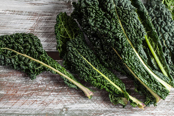 istock Organic Lacinato Kale wood table 627250644