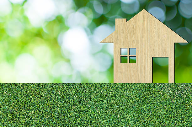 istock house icon from  wooden on grass texture nature background 627251606