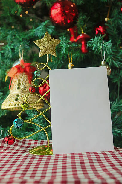 istock Christmas template background with blank white greeting card 627253726
