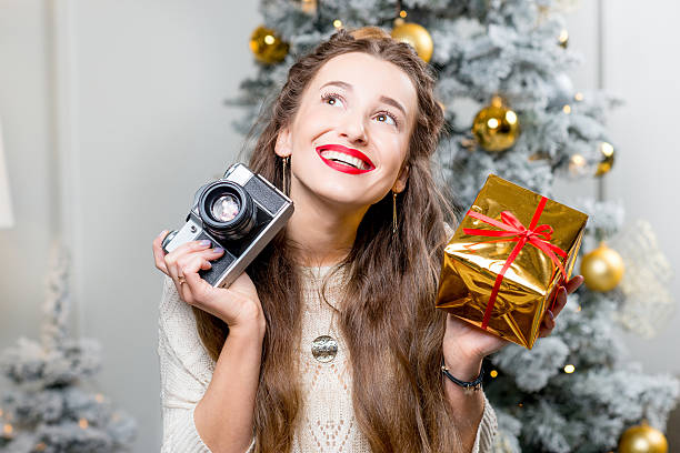 istock Woman celebrating winter holidays 627253906