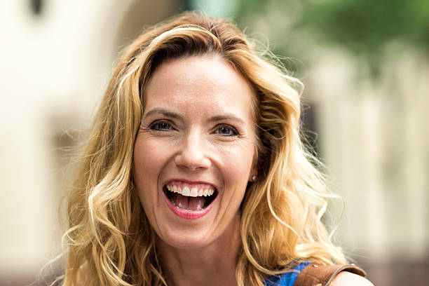 istock Urban Mature Blond Woman 627253962