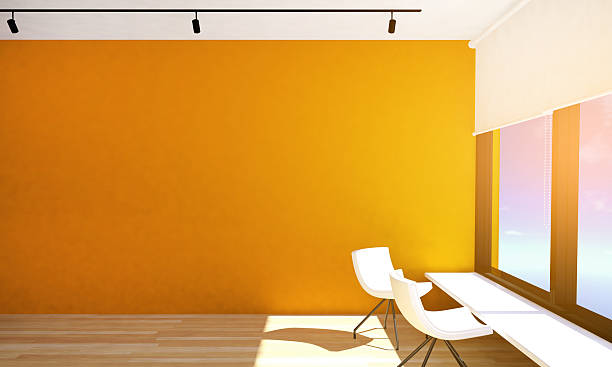istock Empty room interior with orange wall and parquet floor 627253974