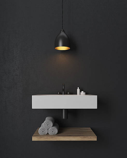 istock Bathroom sink with wooden shelf under it on black wall 627254634
