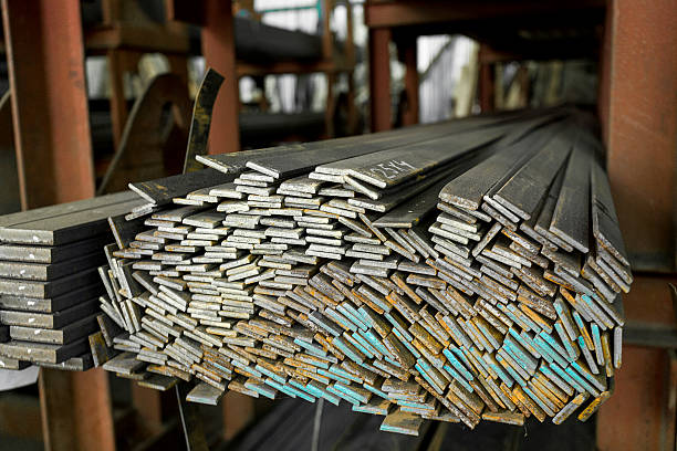 stainless steell pipes, bars and beams deposited in stacks - ورق سیاه فولادی اصفهان اهن stok fotoğraflar ve resimler