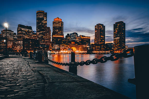 istock Boston Harbor and Financial District at twilight in Boston, Massachusetts. 627255198