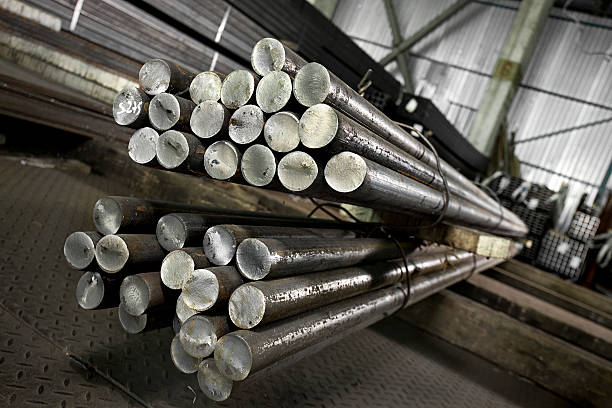 istock Stainless steell pipes, bars and beams deposited in stacks 627260034