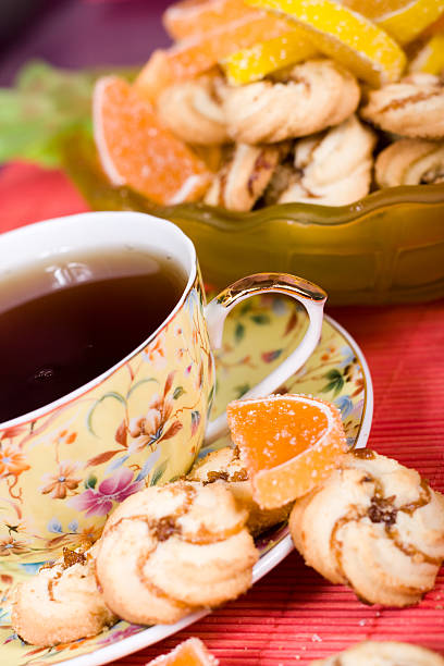 istock Cup of tea and cookies 627260134