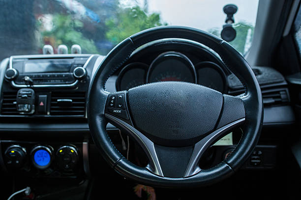 istock Steering wheel, Interior view of car. 627260568