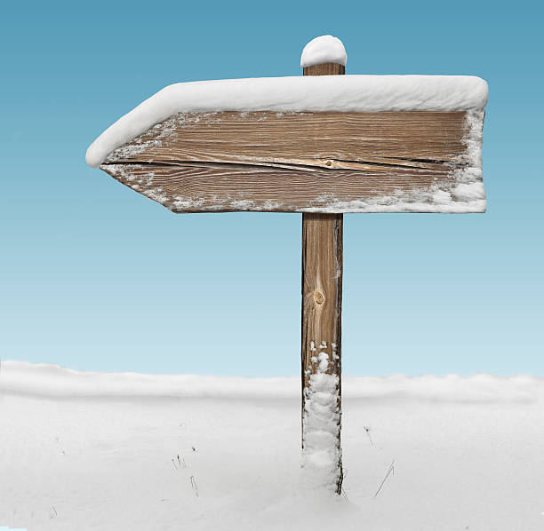 istock Wooden direction sign with with sky on background 627264068
