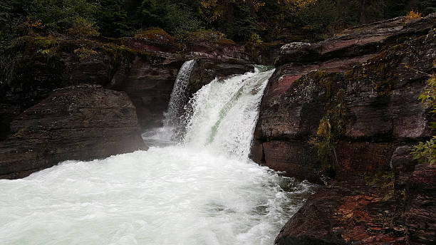 istock Rushing water bursts through the rocks. 627264238