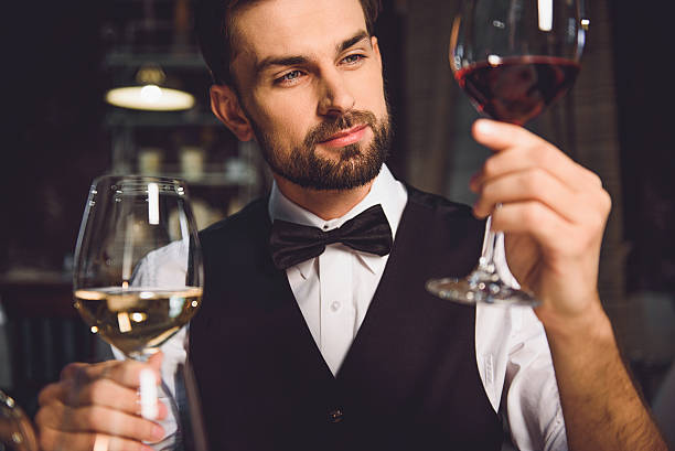 istock Immersed alcohol critic fixedly gazing at wine 627268774