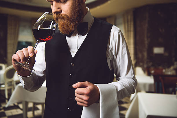 istock Man inhaling race of wine 627269804
