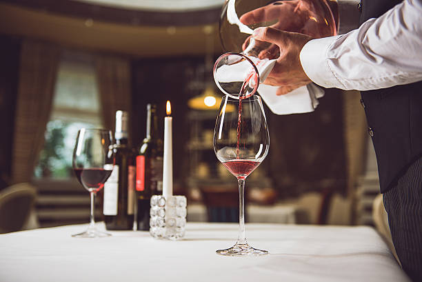 istock Process of filling glass with wine 627270668
