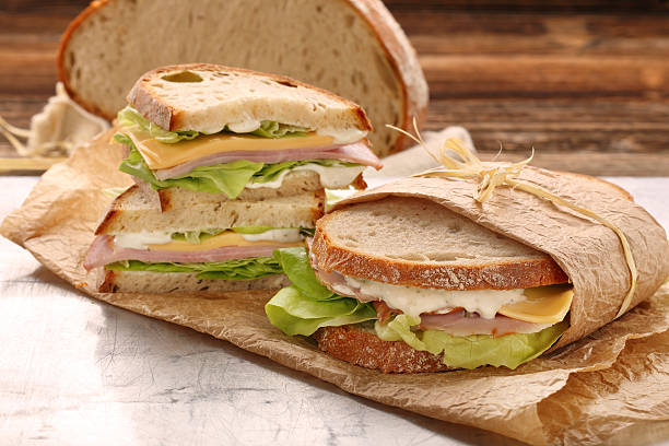 istock Fresh sandwich with ham cheese and lettuce 627270724