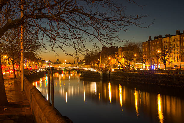 Ha'penny Bridge Dublin at dusk over the river Liffey, Dublin, Ireland.