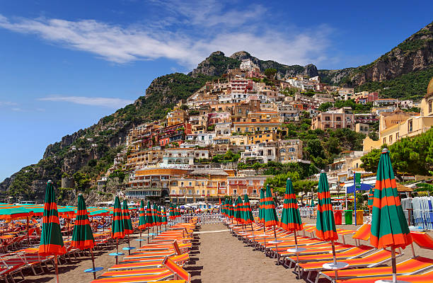 Summertime seascape. Amalfi coast: Positano beach.Italy (Campania). Picturesque view from the beach of the residential units. positano photos stock pictures, royalty-free photos & images