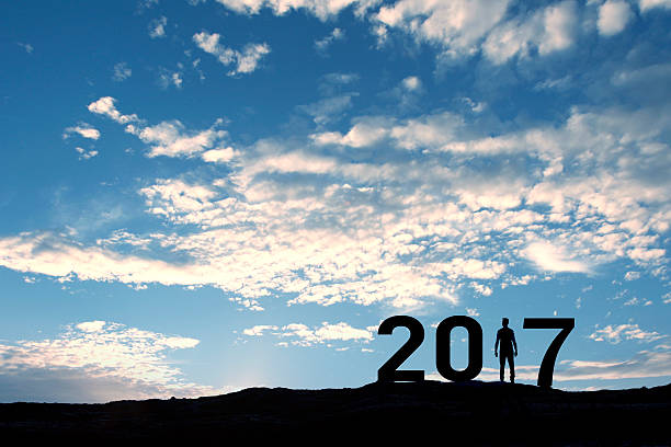 istock 2017, silhouette of a man standing in the sun 627273492