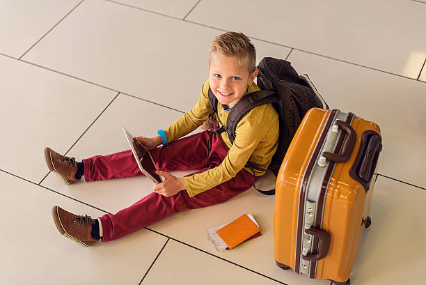 istock Adoralbe little boy at airport 627280504