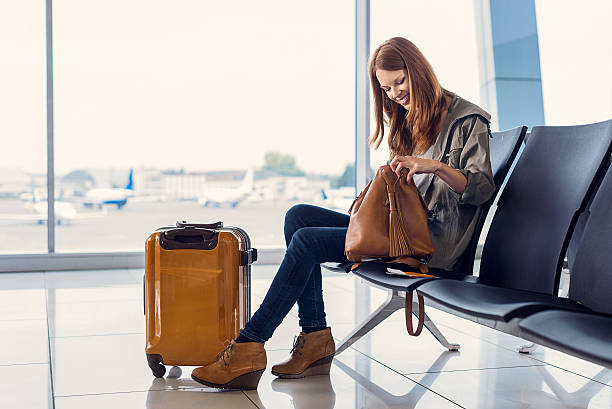 istock Smiling girl waiting for boarding 627281342