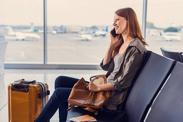 istock Smiling girl waiting for boarding 627281370