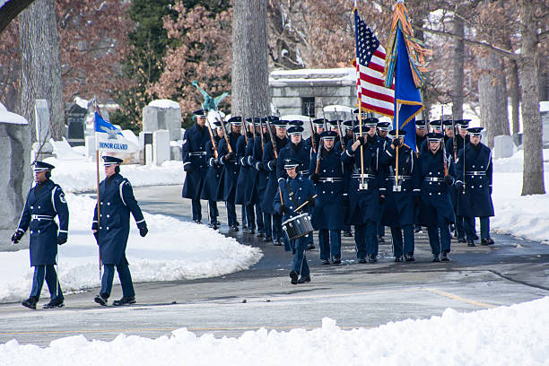 Honor Guard Marches during militery Funeral At Arlington National Cemetery stock photo