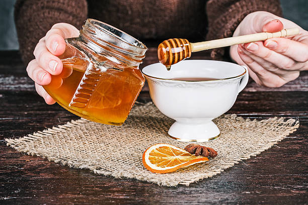 miel y taza de té - badian fotografías e imágenes de stock