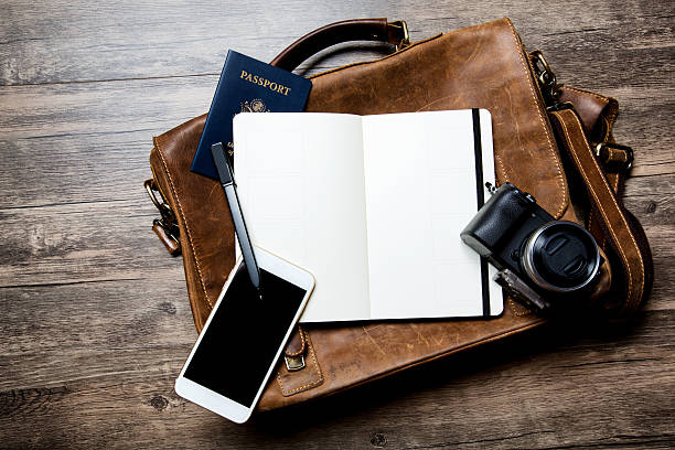 classic leather briefcase with open notebook on wood - obsolete suitcase old luggage imagens e fotografias de stock