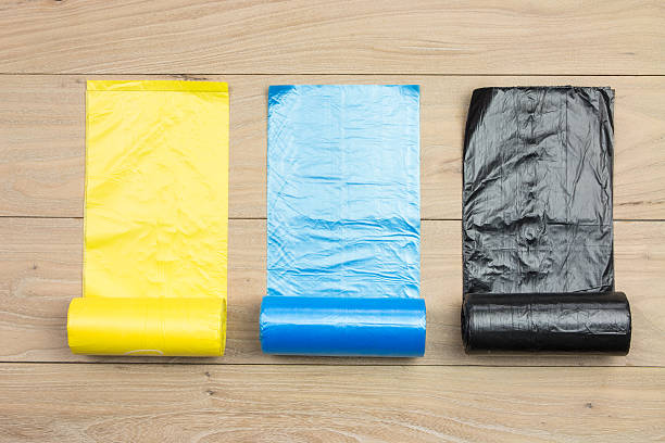 Colored garbage bags roll stock photo