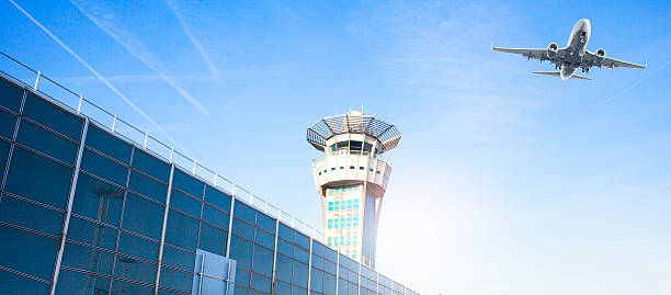 Vancouver, British Columbia, Canada. Apr 7, 2024. A close-up view of the Vancouver International Airport control tower on a clear day against a backdrop of blue sky.